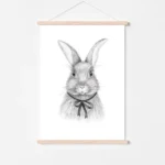 Pencil drawing of rabbit with bow on wall.