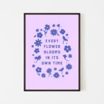 “every flower blooms in its own time” inspirational quote with floral design in blue hues - black frame