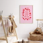 “every flower blooms in its own time” inspirational quote with floral design in red hues in nursery room