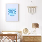 "Power to change the world" inspirational quote print by Roald Dahl - timber frame in minimalist bedroom decor.