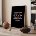 "Power to change the world" inspirational quote print by Roald Dahl - timber frame with vintage sports balls nearby