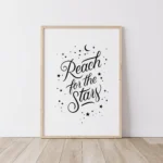 White inspirational poster: Reach for the Stars - timber frame print on floor