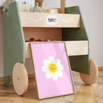 Decorative cart with daisy artwork on floor