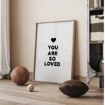 Inspirational poster with 'You Are So Loved' message.