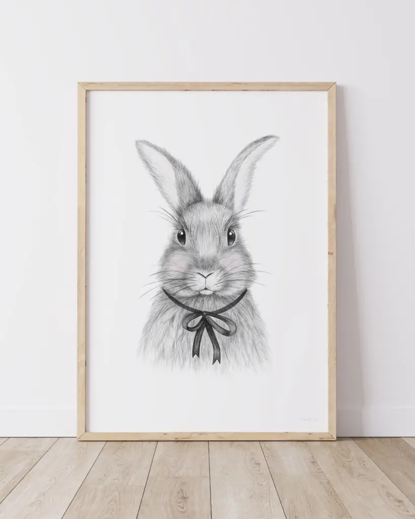 Framed rabbit drawing with black ribbon bow