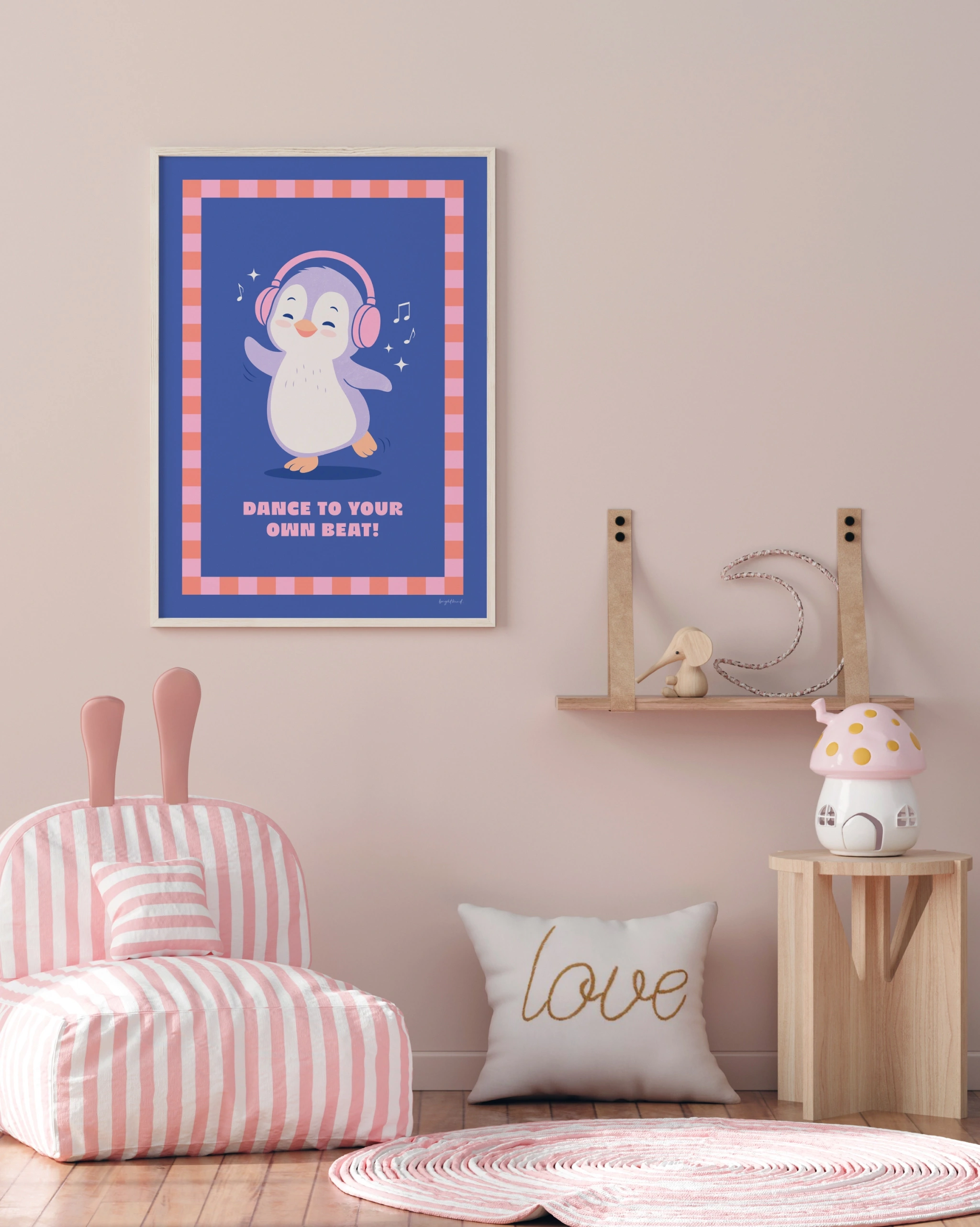 Kids room with penguin wall art and striped chair